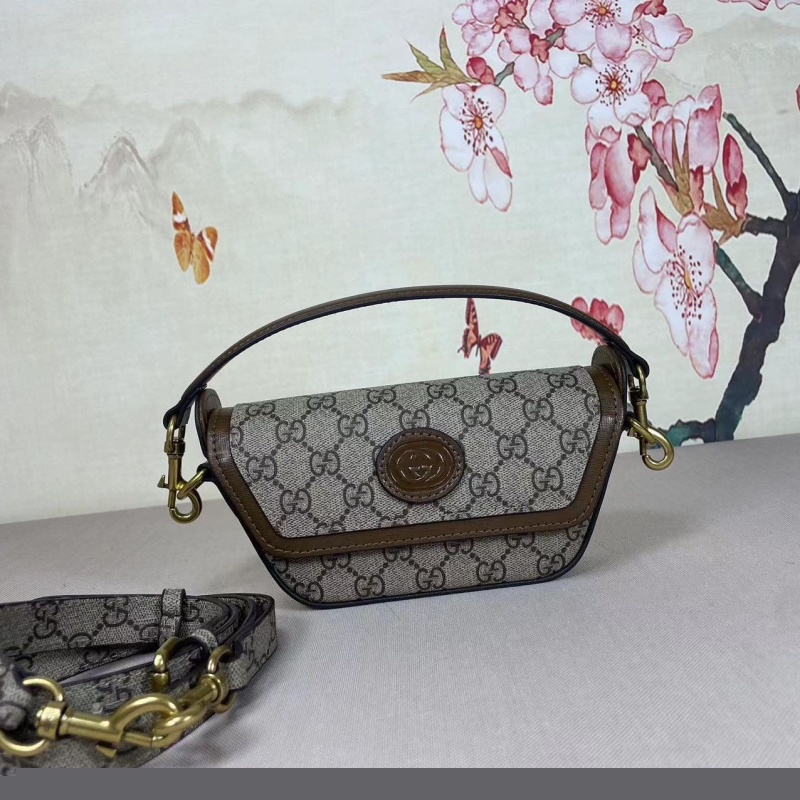 G*u*i top handle bags